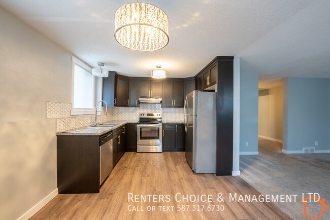 Building Photo - 2 Bedroom Basement Suite, Assigned Parking...