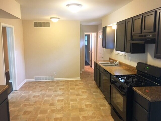 Building Photo - LAWRENCE 4 BEDROOM W/BASEMENT RECENTLY UPDATED!  AVAILABLE NOW!