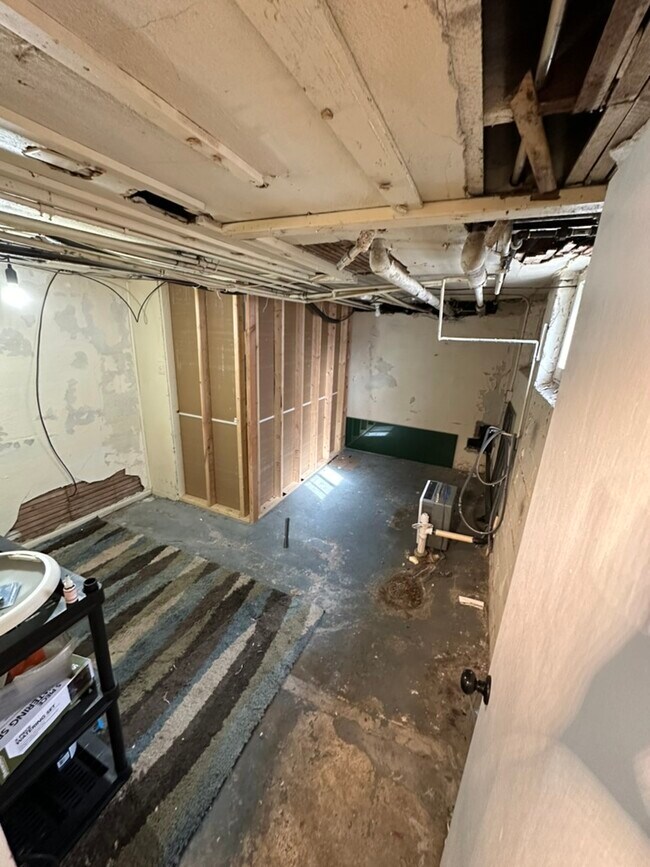 Storage Room immediately to the right after walking into the space - 4135 Portland Ave