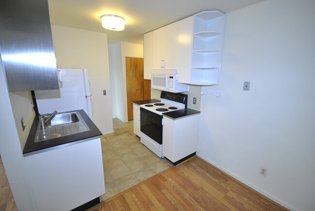 One-Bedroom Kitchen - The Sans Souci
