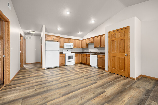 Upper apartment kitchen/living space, view 2 - Fifth Street Apartments & Townhouses