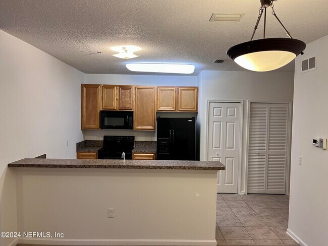 Building Photo - 8241 Pelican Landing Rd