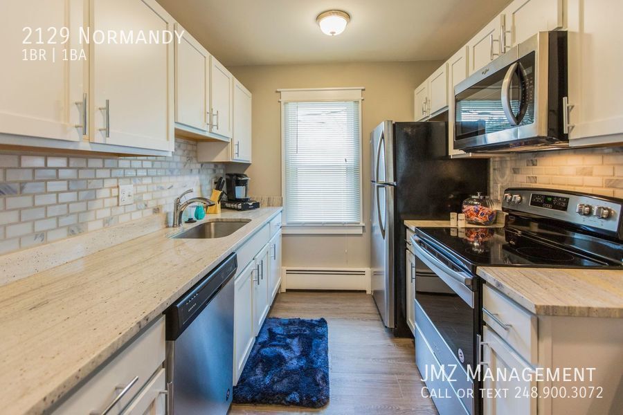 Primary Photo - Beautifully Updated Ranch Style Unit In Ro...