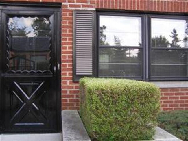 Unit Front Door and Entrance Patio - 6350 N College Ave