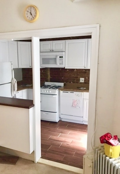 Building Photo - 2 BED 1 BATH Condo on the 1st Floor of The...