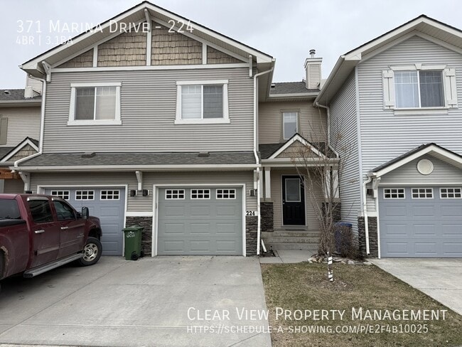 Building Photo - ?? Beautifully Renovated 4 Bed / 3.5 Bath Home with Garage and Fenced Yard in Chestermere Station...