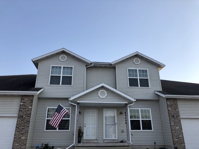 Building Front (5133 on right) - 5133 Horned Owl Dr