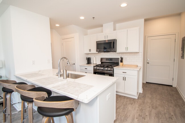 Building Photo - Live Well Apartments - Fully Furnished Units