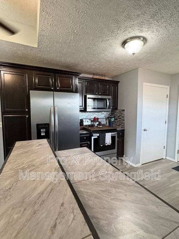 Building Photo - 4444 N Farm Rd 157