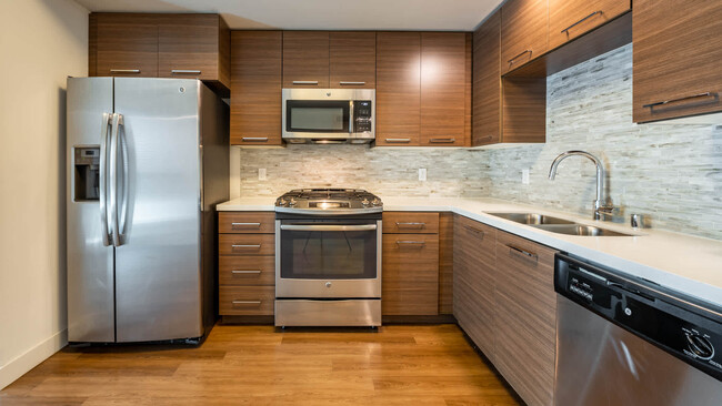 Kitchen with Stainless Steel Appliances - Next on Sixth