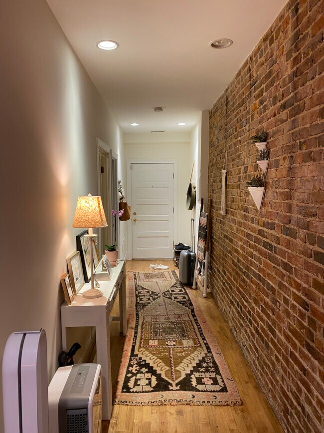 Exposed brick hallway - 1215 10th St NW