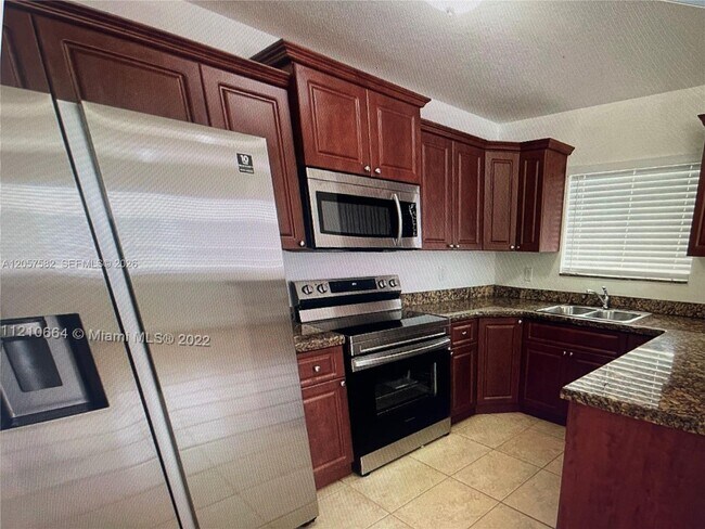 Building Photo - 5881 NW 32nd Ave