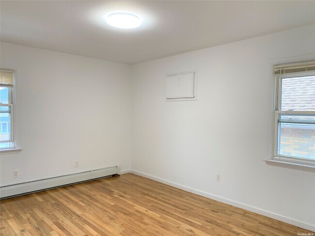 Building Photo - 128-14 11th Ave