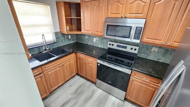 Building Photo - 5046 SW 145th Ave
