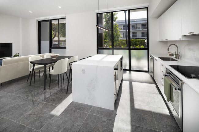 Cocina, comedor y sala de estar de Signature Collection Townhome - Avalon South Miami