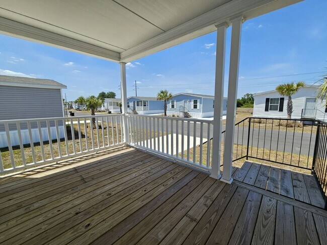 Foto del edificio - 6710 Hidden Oaks Dr