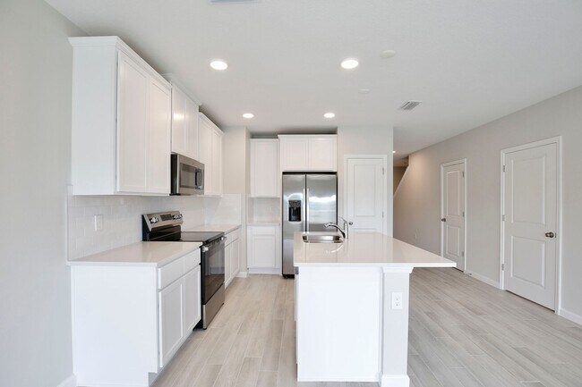 Building Photo - Brand-New 3/2.5 Modern Townhome in Gated T...