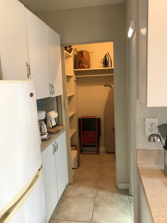 Semi walk in closet with pantry/shelf space - 345 9th Ave NE