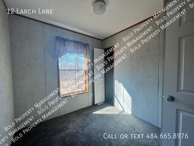 Foto del edificio - 12 Larch Ln