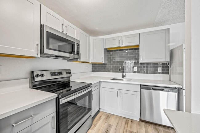 Building Photo - Oak & Iron Flats by Trion Living