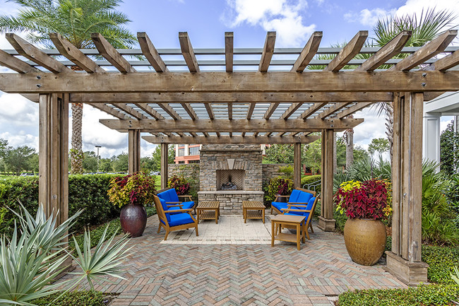 Poolside Lanai with Fireplace Conversation Area - Coventry Park Apartments