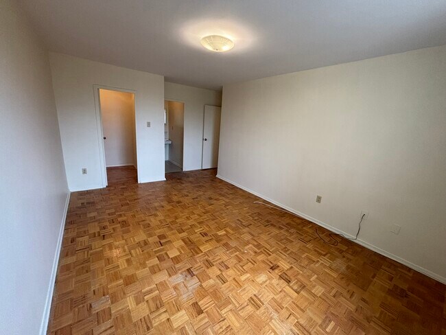 Building Photo - 1061 Queen's Blvd