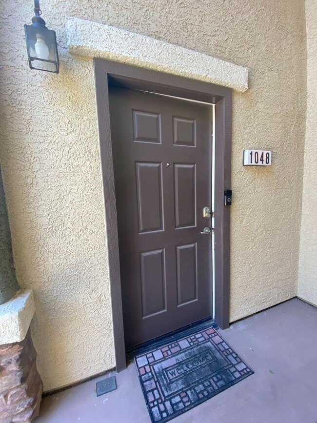 Building Photo - First Floor Unit with 2 Car Garage with Di...