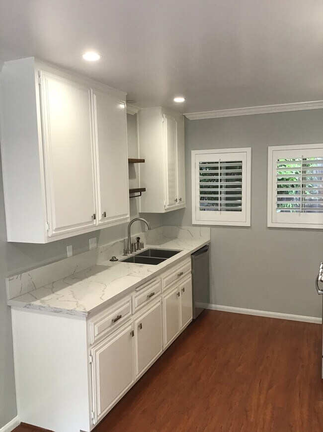 New counter tops. New microwave. New fixtures lighting and paint - 1741 10th St