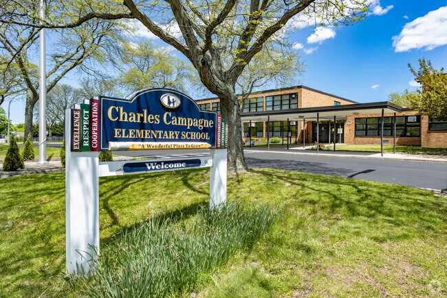 The Charles Campagne Elementary School in Bethpage, NY is a beautiful sprawling building on a large green campus.