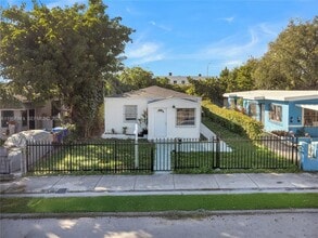 Building Photo - 6940 NW 6th Ct