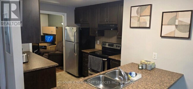 Photo du bâtiment - 3789 B CANYON WALK DRIVE