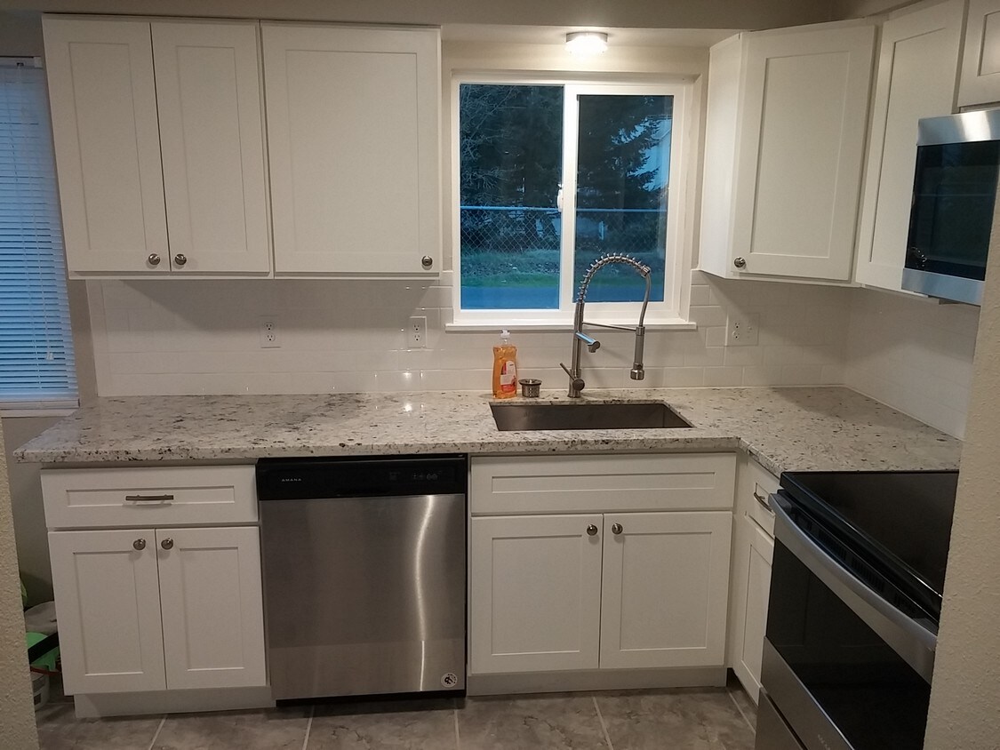 brand new kitchen with granite counter tops - 12915 47th Ave SW