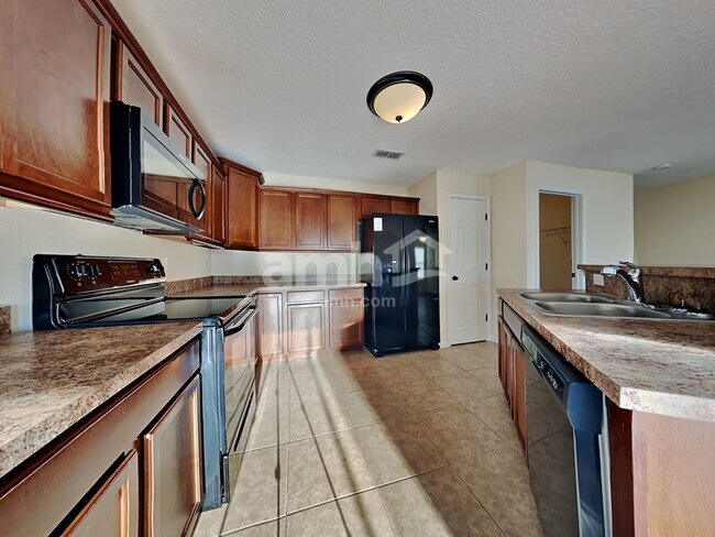 Building Photo - 9630 Mayville Dr E