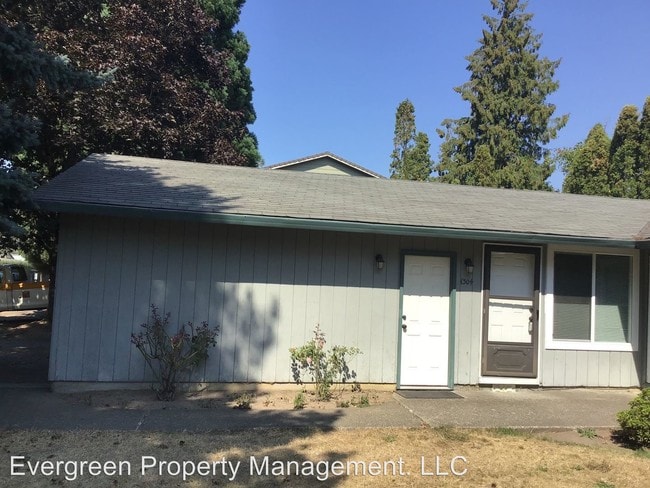 Building Photo - 1300-1304 NE Kane Dr