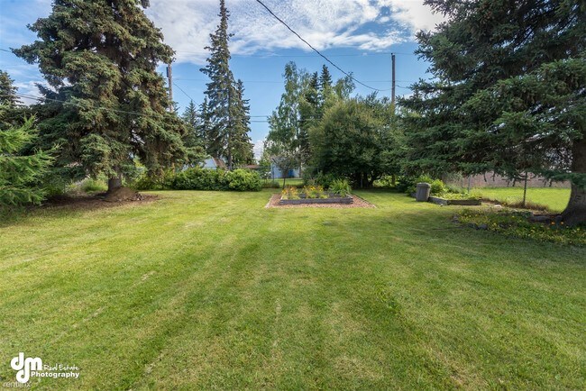 Foto del edificio - 3 br, 1 bath House - 6520 East 10th Ave