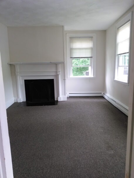 Living Room - carpet has been updated. - 53 Vernon St