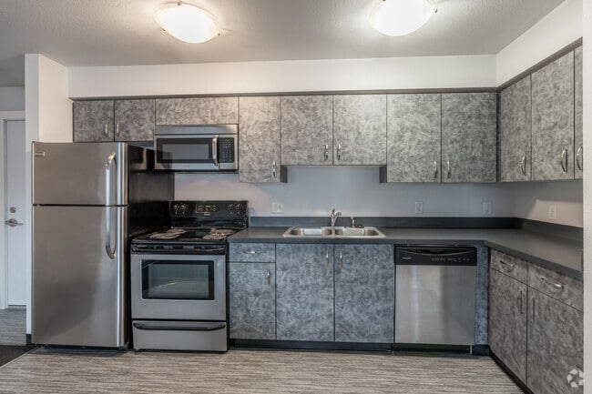 3BR, 2BA - 1,081SF - Kitchen - MW2