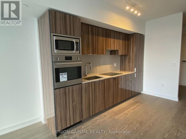 Building Photo - 11 Wellesley St W