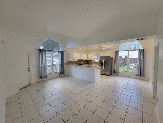 open living space with vaulted ceilings - 35 SW 7th St
