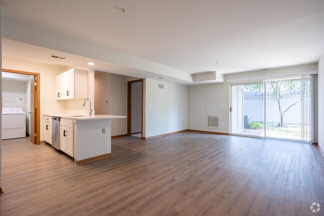 First floor has LVP throughout main living spaces - Churchill Place Apartments