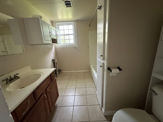 Building Photo - Welcome to this charming 3-bedroom, 2-bathroom home located in Atkins, AR