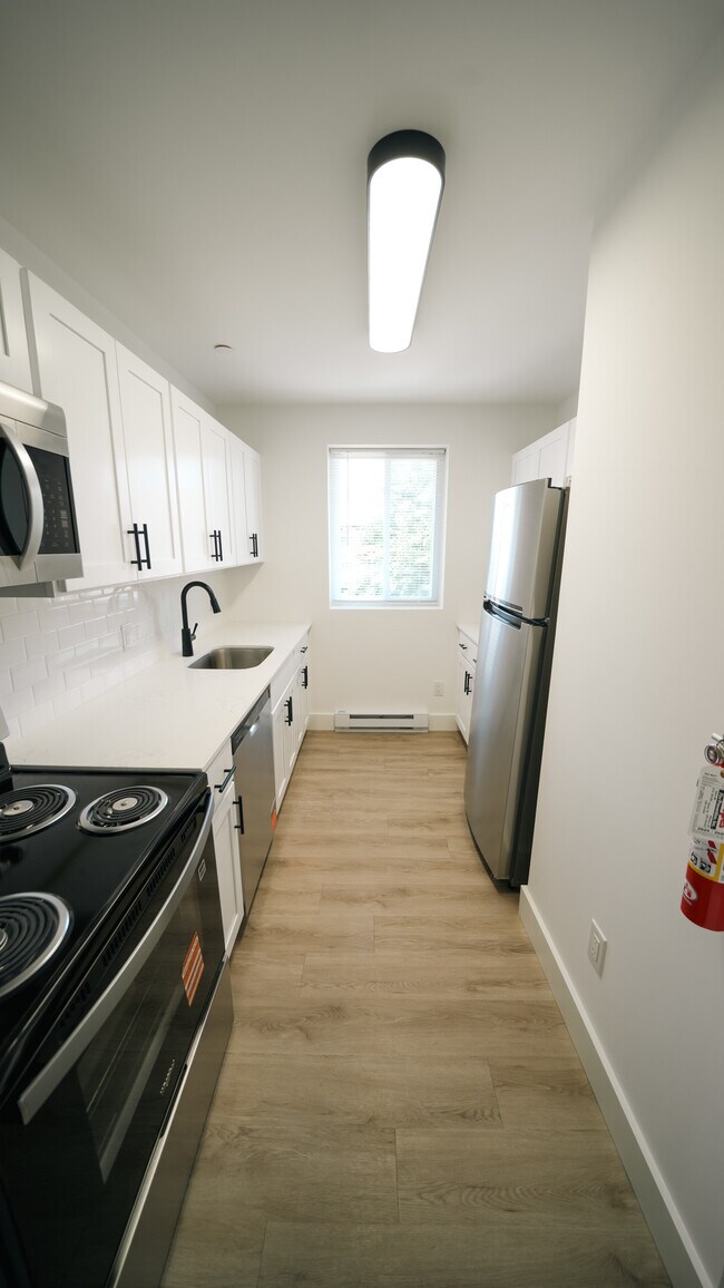 Kitchen with Electric Appliances - Southgate Gardens Apartments