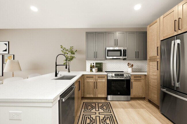 Cocinas elevadas con electrodomésticos de acero inoxidable. - Laurent