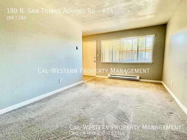 Building Photo - Spacious, upstairs 2/1 apartment near West...
