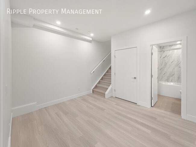 Photo du bâtiment - BRAND NEW 2 BEDS, 1 BATH BASEMENT SUITE | CENTRAL AC | PRIME BOWNESS LOCATION