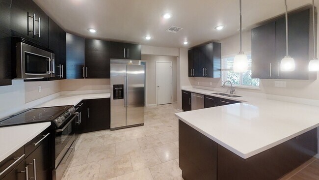 Building Photo - 8308 E Highland Ave