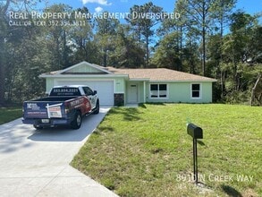 Building Photo - 8910 N Creek Way