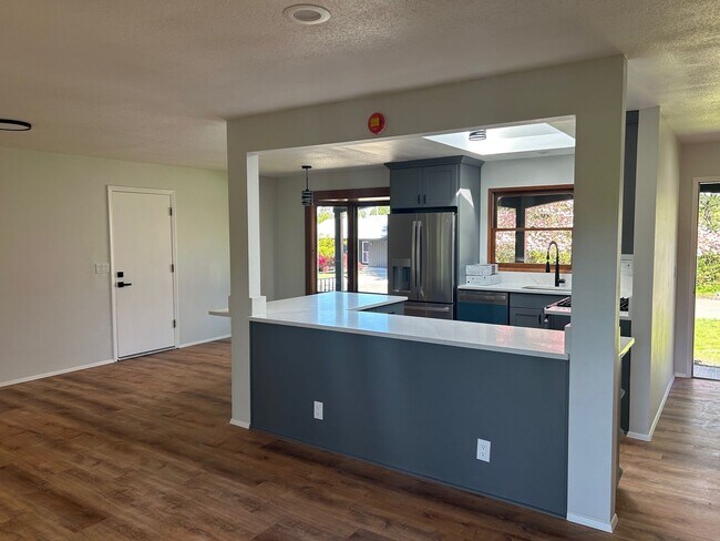 Building Photo - Completely Remodeled Home that Backs up to...