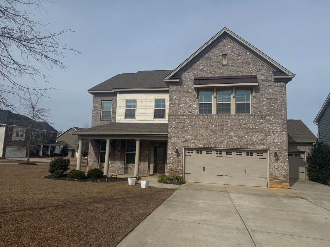 Building Photo - Spacious All-Brick Corner Lot Home with 3-Car Garage, Bonus Room & Resort-Style Amenities