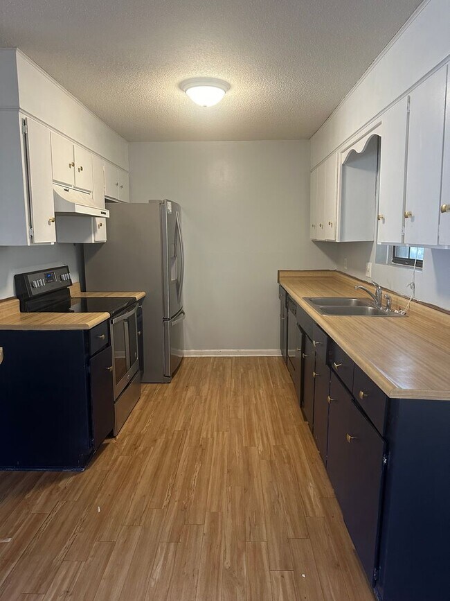 Building Photo - Available Now